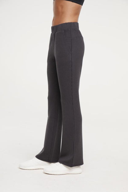 Paige Bootcut Pant, alternate angle view, showing visible design features and texture of the durable stretch fabric.. 