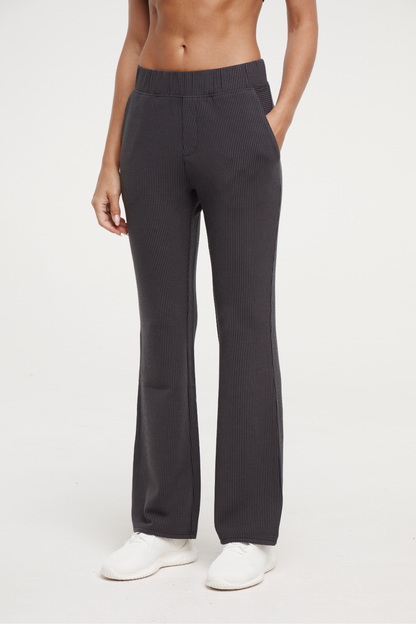 Paige Bootcut Pant, alternate angle view, showing visible design features and texture of the durable stretch fabric.. 