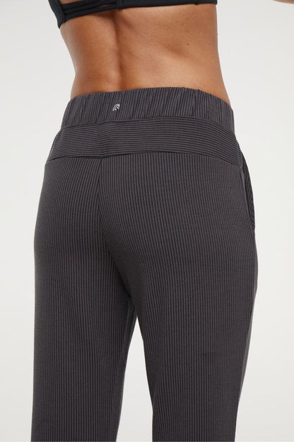 Paige Bootcut Pant, alternate angle view, showing visible design features and texture of the durable stretch fabric.. 