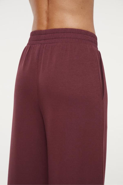 Sage Wide Leg Pant, side view showing pocket placement, showing visible design features and texture of the durable stretch fabric.. 