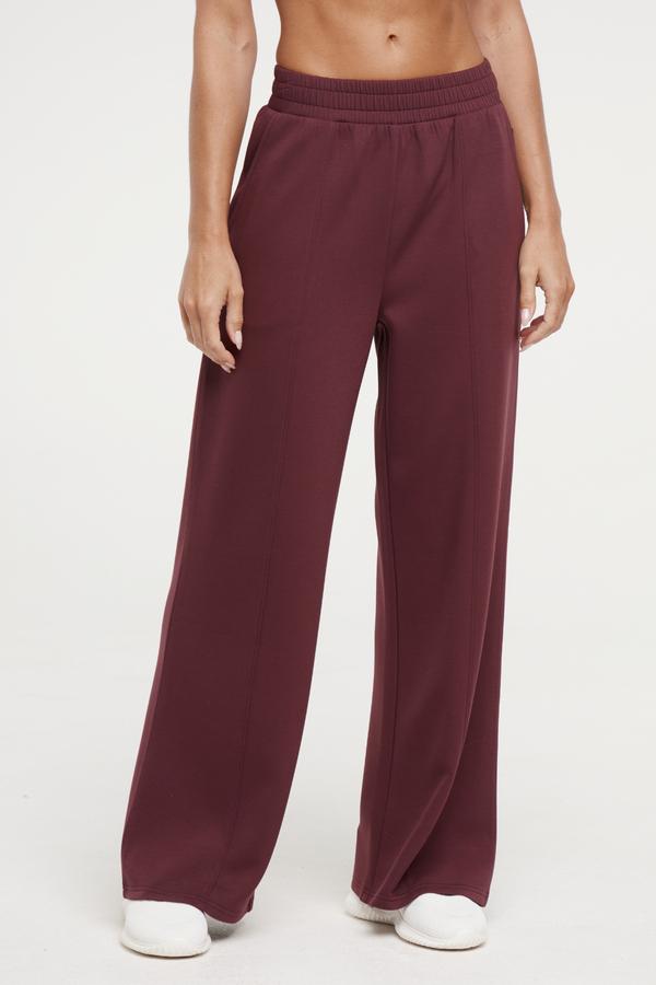 Sage Wide Leg Pant, alternate angle view, showing visible design features and texture of the durable stretch fabric.. 