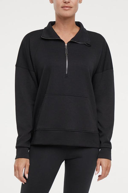 Sage 1/2 Zip, alternate angle view, showing visible design features and texture of the soft knit fabric.. 