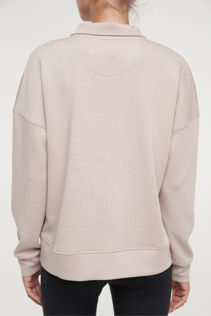 Sage 1/2 Zip, alternate angle view, showing visible design features and texture of the soft knit fabric.. 