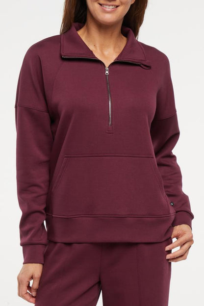 Sage 1/2 Zip, alternate angle view, showing visible design features and texture of the soft knit fabric.. 