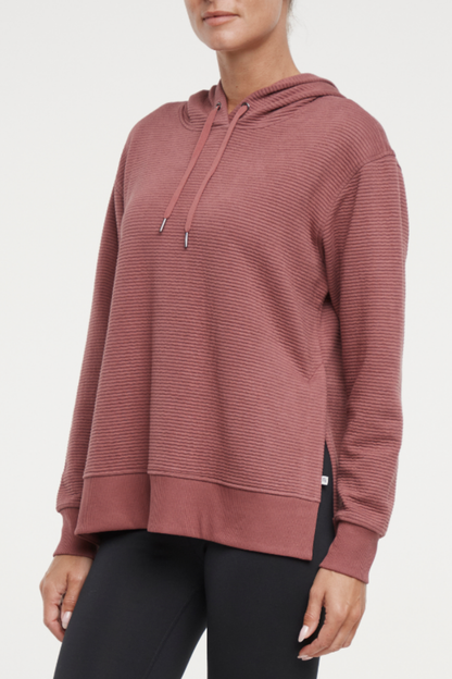 Cora Pullover Hoodie, front view, showing visible design features and texture of the soft fleece fabric.. 