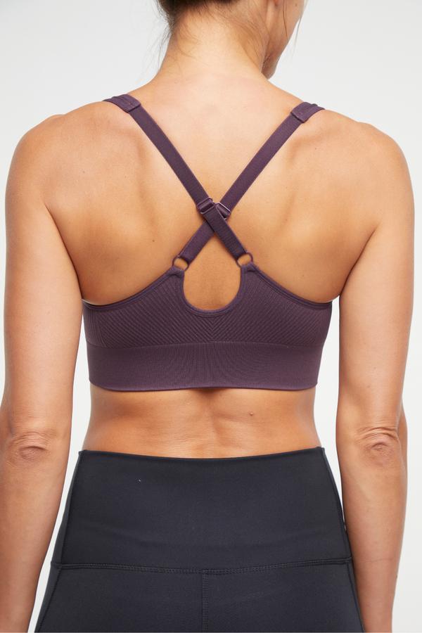 Addie Seamless Sports Bra, alternate angle view, showing visible design features and texture of the soft knit fabric.. 