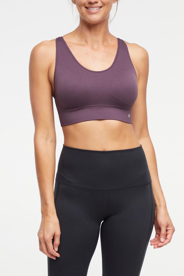 Addie Seamless Sports Bra, alternate angle view, showing visible design features and texture of the soft knit fabric.. 