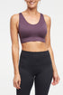Addie Seamless Sports Bra, alternate angle view, showing visible design features and texture of the soft knit fabric.. 