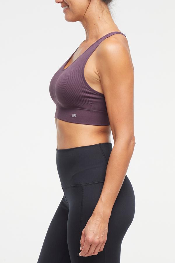Addie Seamless Sports Bra, alternate angle view, showing visible design features and texture of the soft knit fabric.. 
