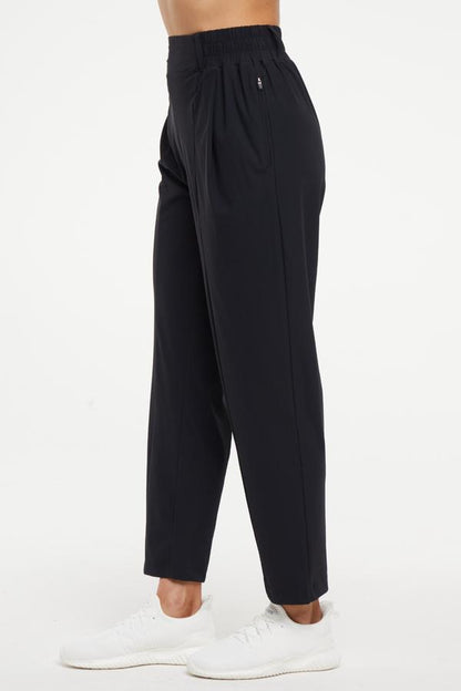 Nori Tapered Pant, alternate angle view, showing visible design features and texture of the durable stretch fabric.. 