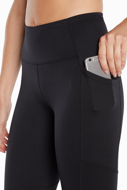 Della Pant - Black, close-up view of fabric and stitching, showing visible design features and texture of the durable stretch fabric.. 