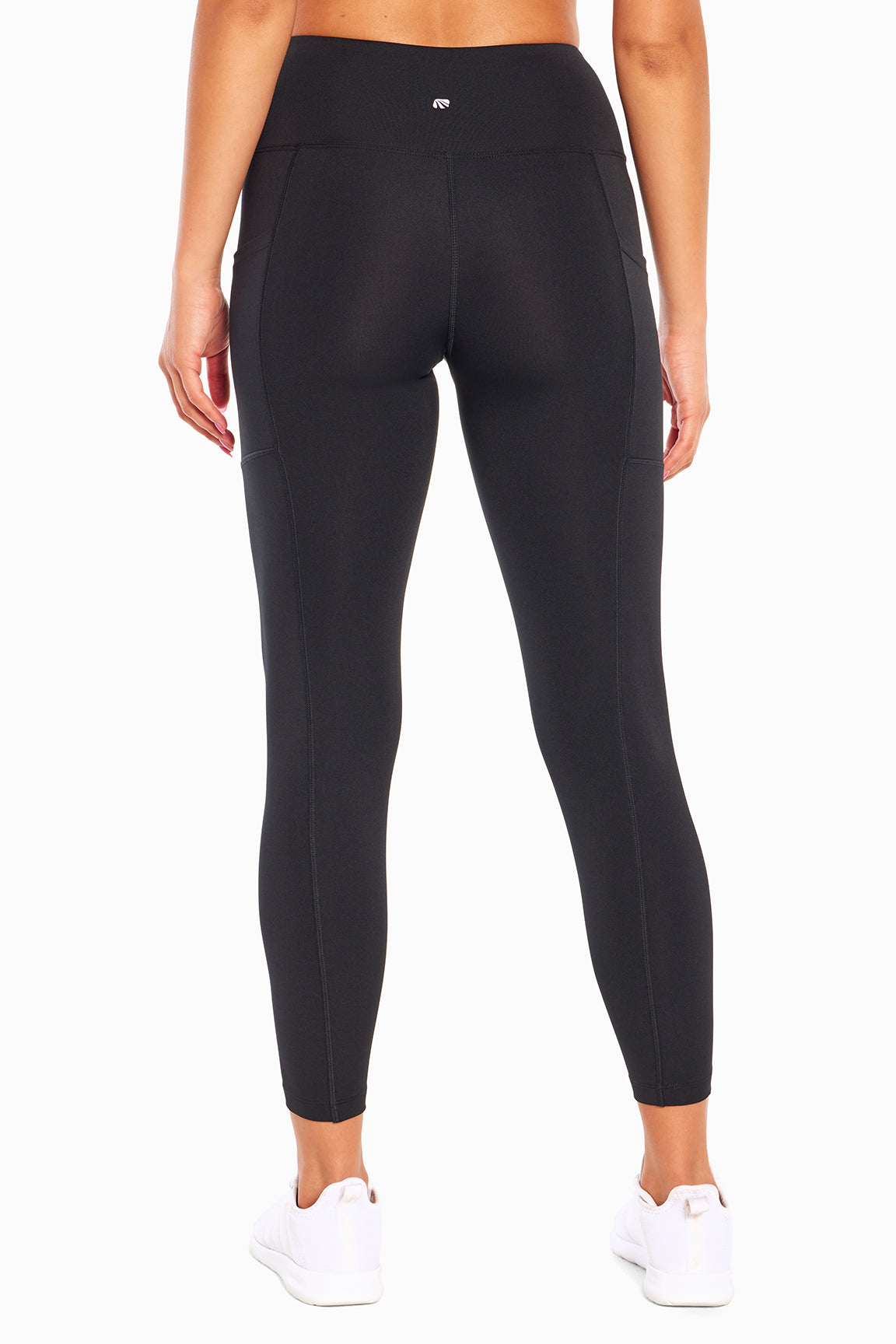 High Rise Side Pocket Ankle Legging - Black, back view, showing visible design features and texture of the stretch knit fabric.. 