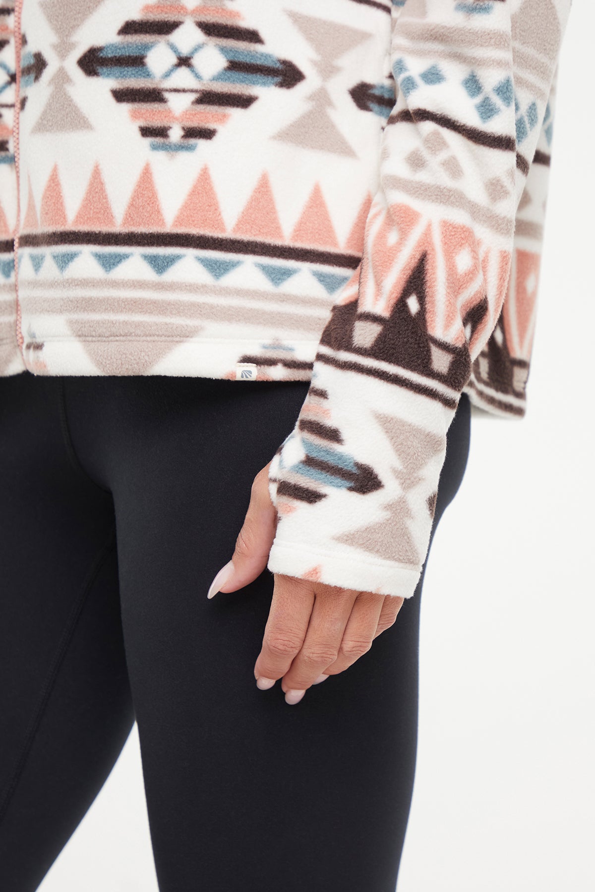 Treeline Fleece Jacket - Cameo Brown Geo Tapestry, alternate angle view, showing visible design features and texture of the smooth woven fabric.. 