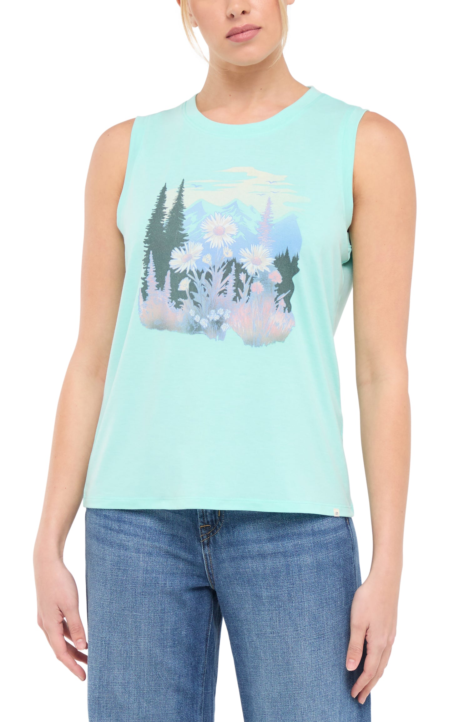 Front view of woman wearing a light teal blue sleeveless shirt with a trees and flowers nature graphic design on a white background. 