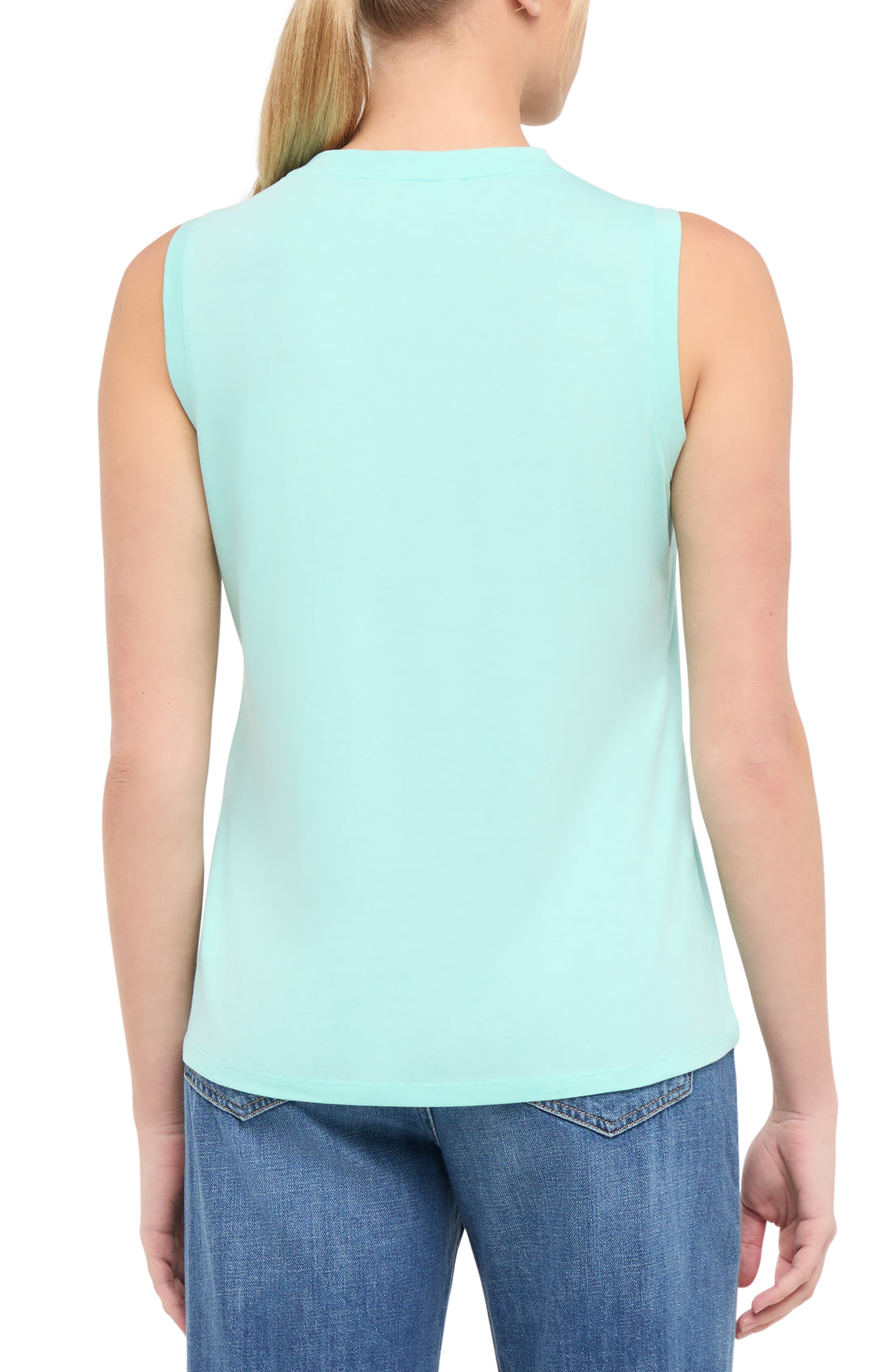 Back view of woman wearing a light teal blue sleeveless shirt on a white background. 