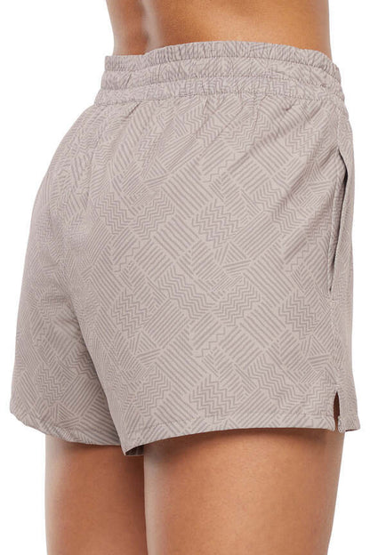 Cassidy Side Pocket Short - Goat Multi Line, side view showing pocket placement, showing visible design features and texture of the soft knit fabric.. 