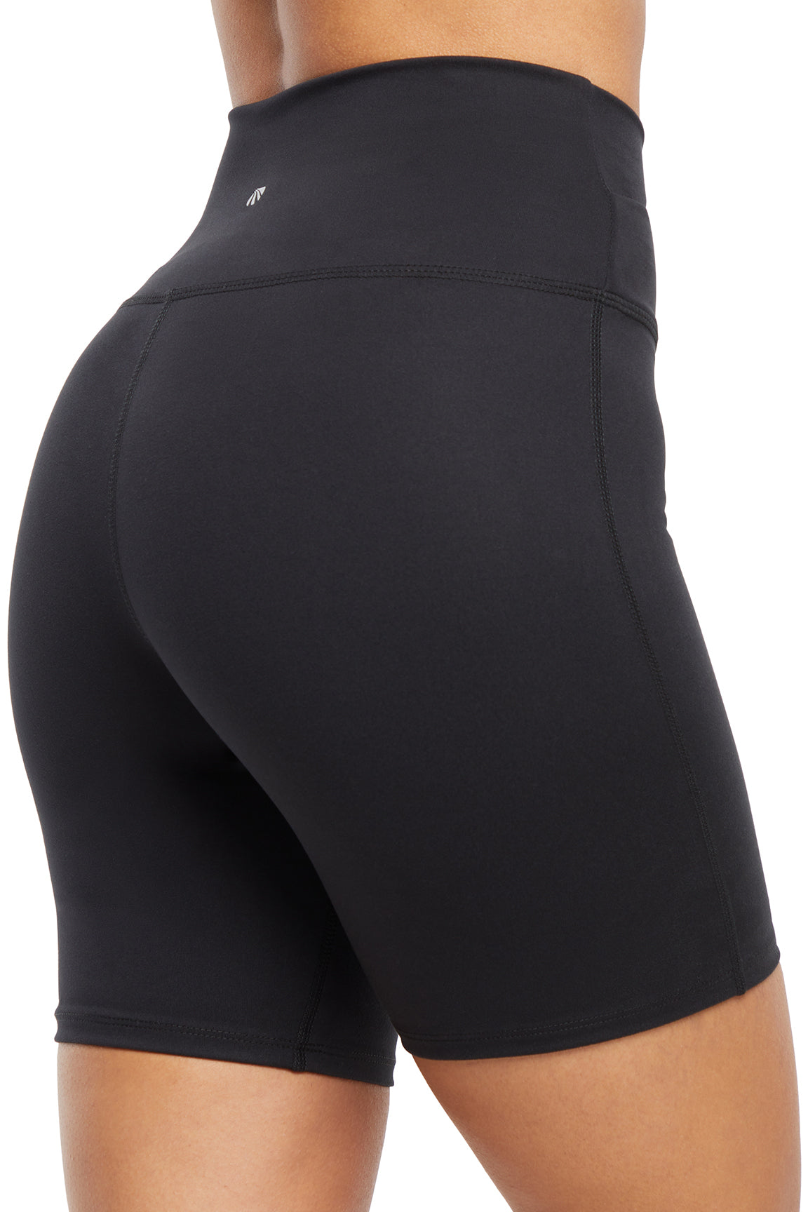Lotus Zen Bermuda - Black, side view showing pocket placement, showing visible design features and texture of the soft knit fabric.. 