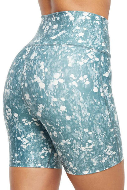 Lotus Zen Bermuda - Sagebrush Green Spots, side view showing pocket placement, showing visible design features and texture of the soft knit fabric.. 