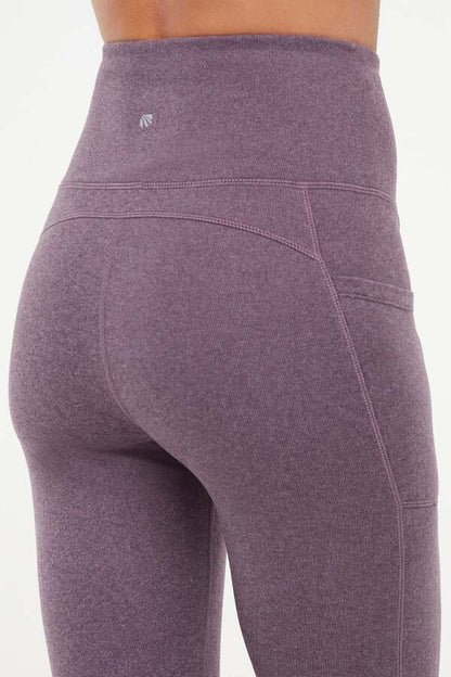Riley Side Pocket Legging - Heather Plum Perfect, side view showing pocket placement, showing visible design features and texture of the stretch.. 