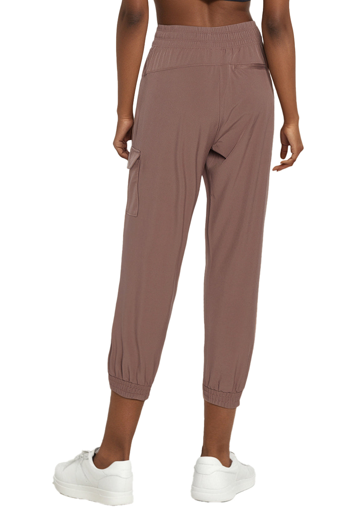 Emma Jogger, side view showing pocket placement, showing visible design features and texture of the soft knit fabric.. 