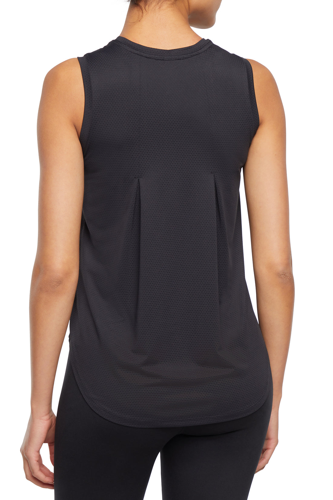 Lily Tank, side view showing pocket placement, showing visible design features and texture of the soft knit fabric.. 