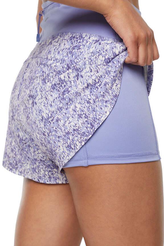 Becca Short, side view showing pocket placement, showing visible design features and texture of the soft knit fabric.. 