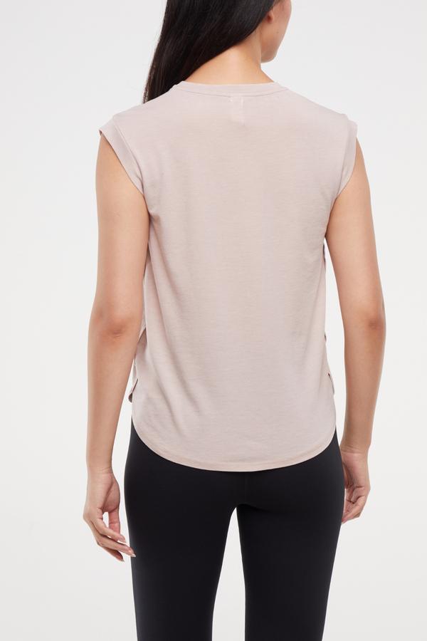 Leona Short Sleeve Top, alternate angle view, showing visible design features and texture of the soft knit fabric.. 