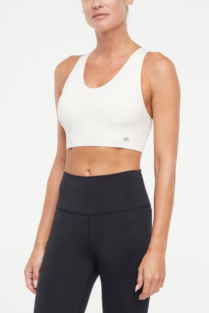 Addie Seamless Sports Bra, alternate angle view, showing visible design features and texture of the soft knit fabric.. 
