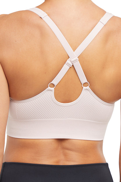 Addie Seamless Sports Bra, alternate angle view, showing visible design features and texture of the soft knit fabric.. 