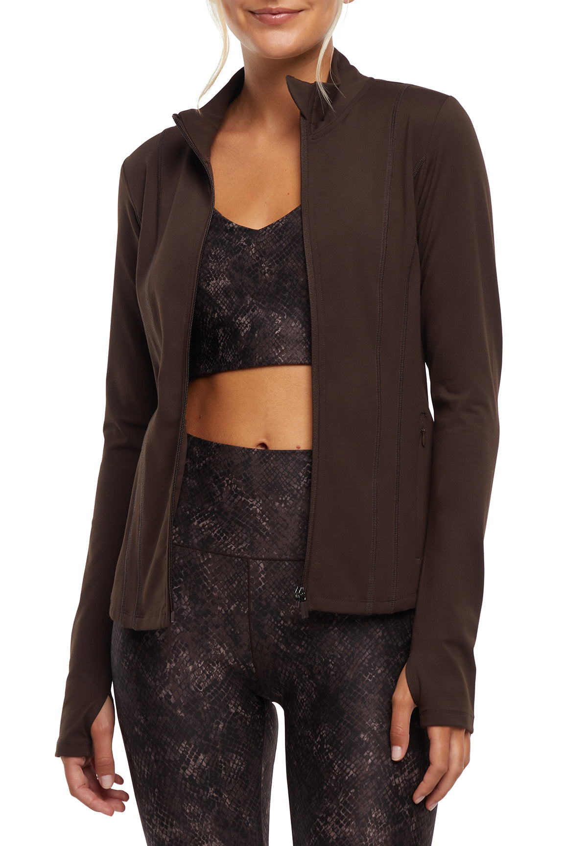 Kate Jacket, close-up view of fabric and stitching, showing visible design features and texture of the smooth woven fabric.. 