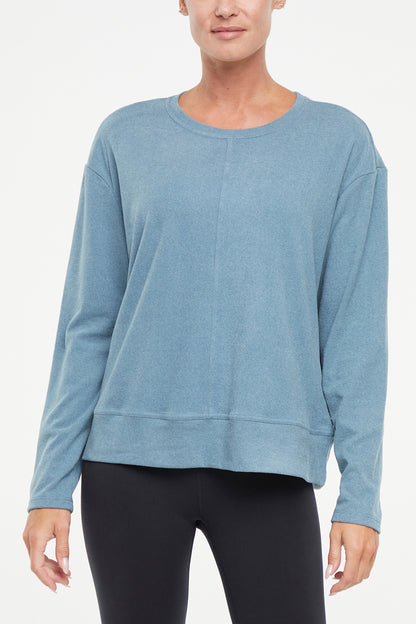 Riley Pullover, alternate angle view, showing visible design features and texture of the soft knit fabric.. 