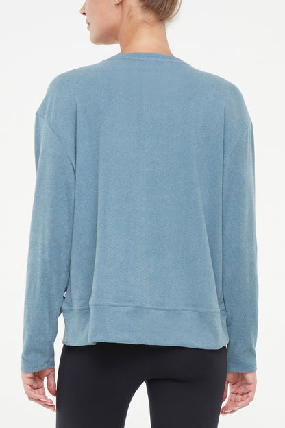 Riley Pullover, alternate angle view, showing visible design features and texture of the soft knit fabric.. 