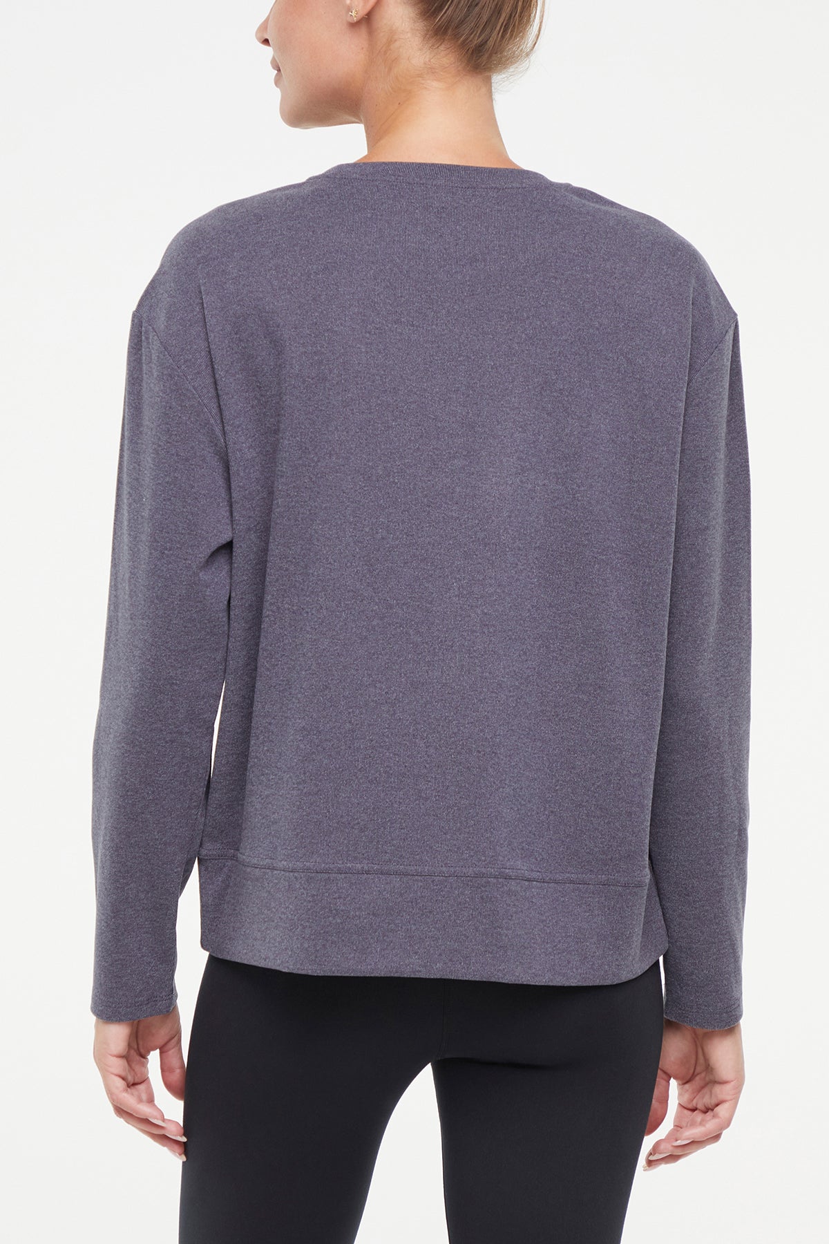 Riley Pullover, side view showing pocket placement, showing visible design features and texture of the soft knit fabric.. 