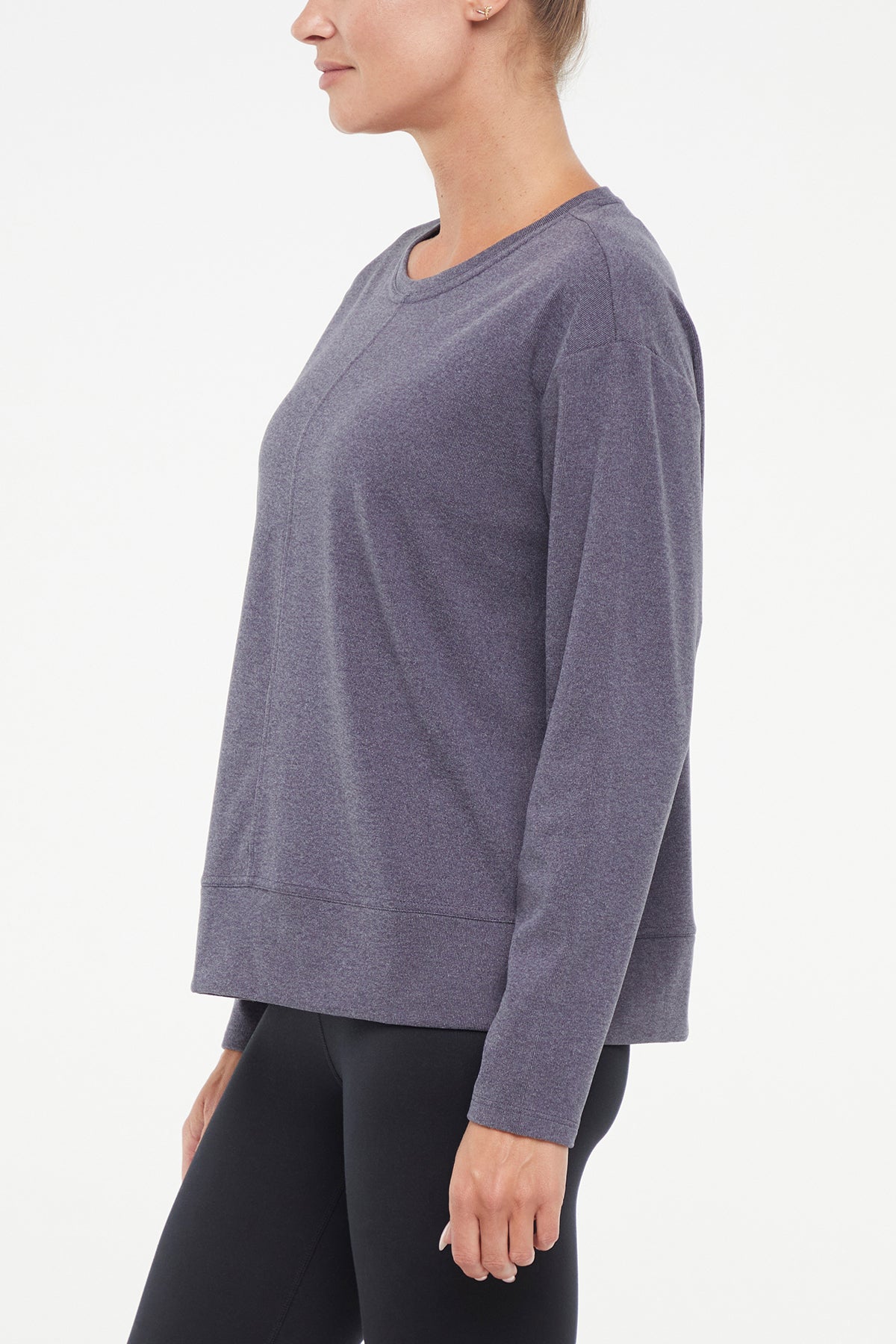 Riley Pullover, close-up view of fabric and stitching, showing visible design features and texture of the soft knit fabric.. 
