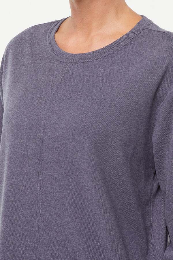 Riley Pullover, back view, showing visible design features and texture of the soft knit fabric.. 