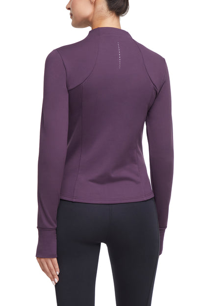 Audrie Jacket, side view showing pocket placement, showing visible design features and texture of the smooth woven fabric.. 