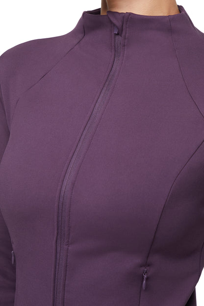 Audrie Jacket, close-up view of fabric and stitching, showing visible design features and texture of the smooth woven fabric.. 