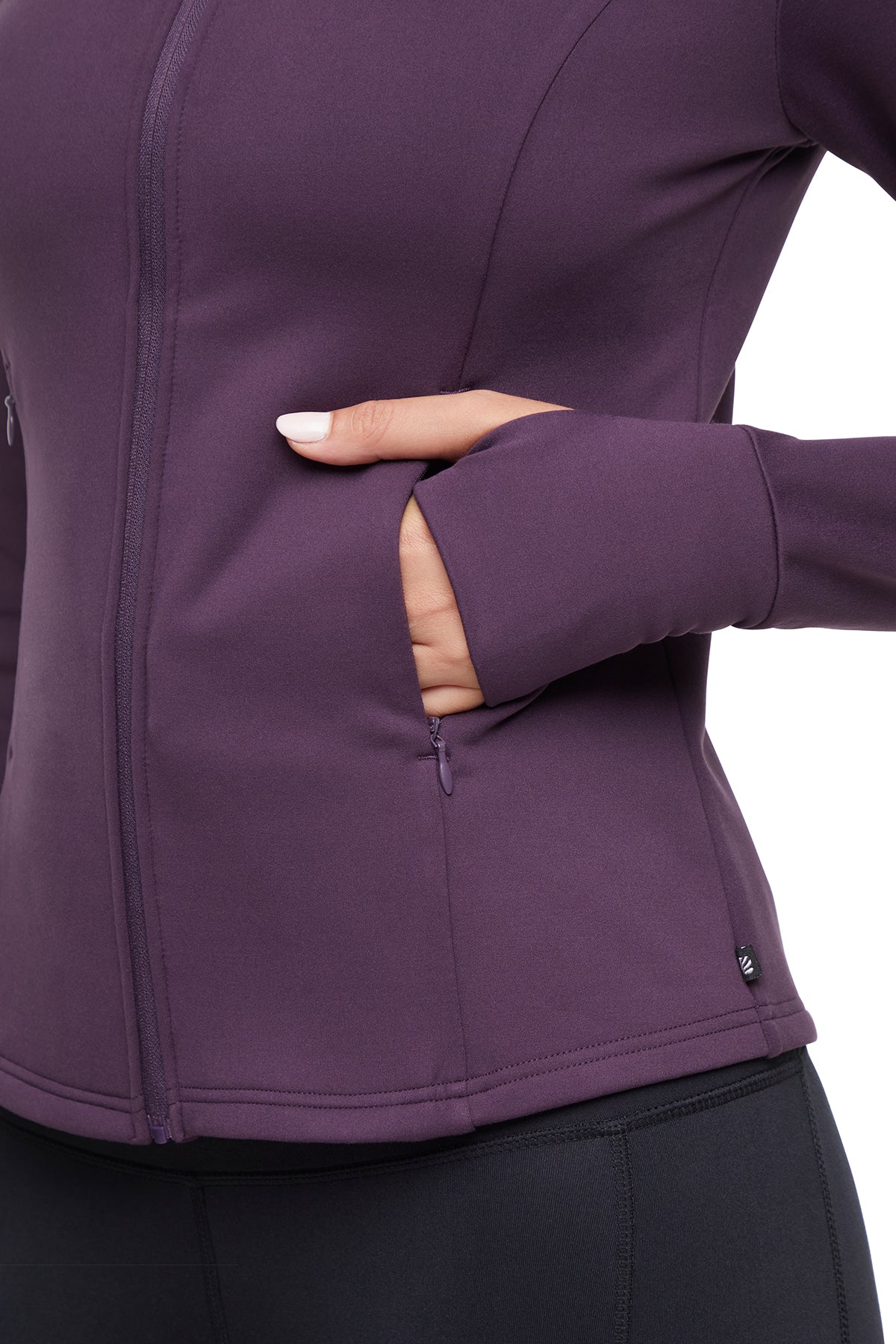 Audrie Jacket, back view, showing visible design features and texture of the smooth woven fabric.. 