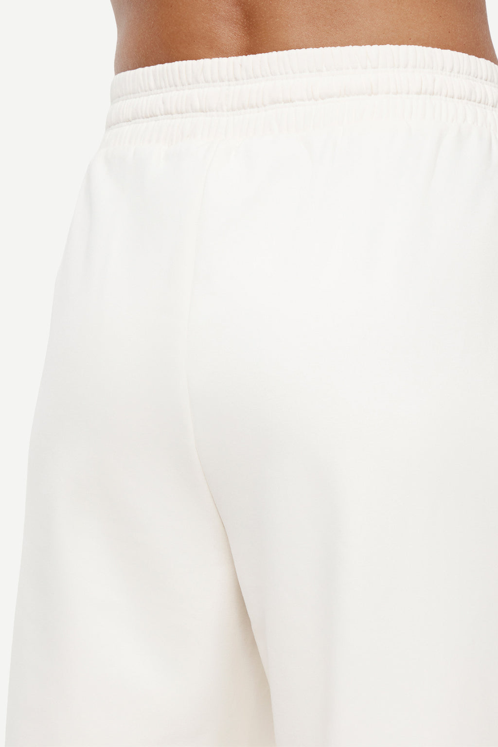 Mia Pant, alternate angle view, showing visible design features and texture of the durable stretch fabric.. #color_egret
