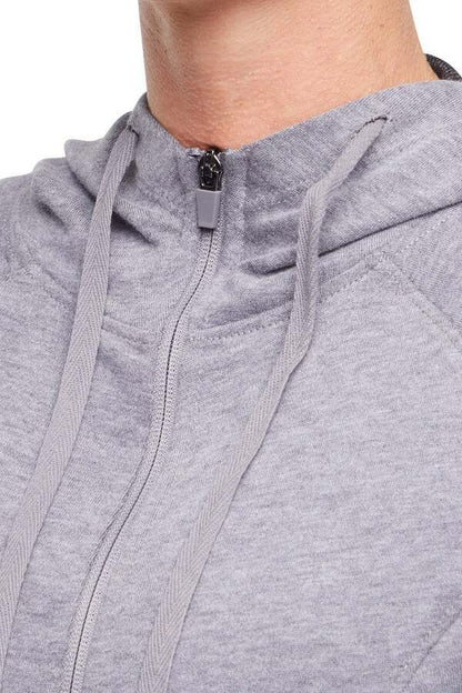 Lyla Jacket, alternate angle view, showing visible design features and texture of the smooth woven fabric.. 