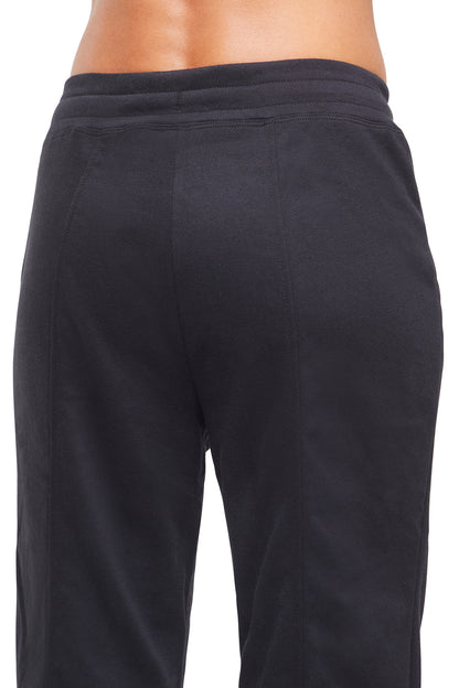Lyla Mid Calf Capri, alternate angle view, showing visible design features and texture of the soft knit fabric.. 