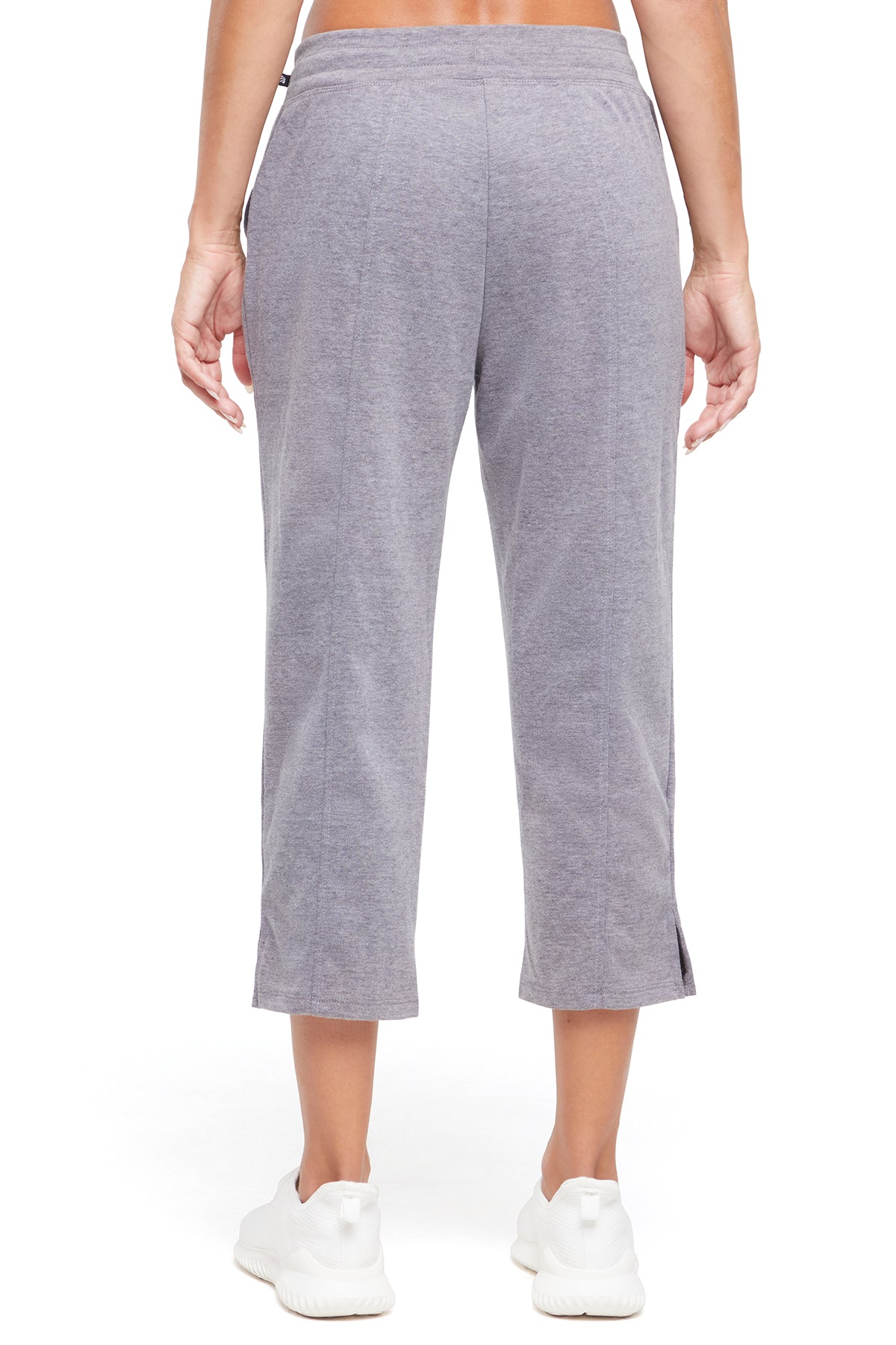 Lyla Mid Calf Capri, side view showing pocket placement, showing visible design features and texture of the soft knit fabric.. 