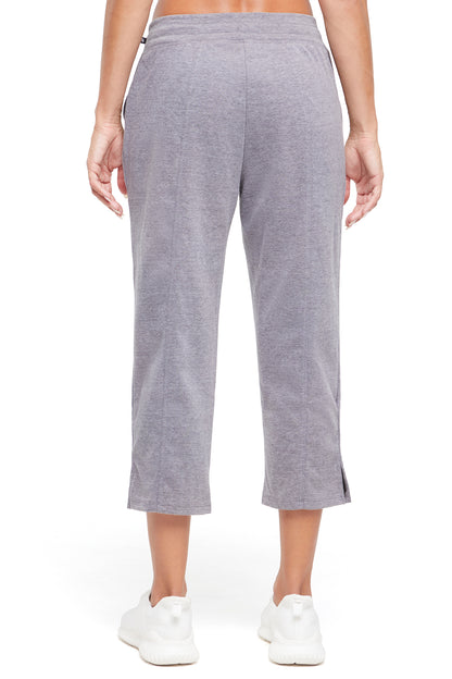 Lyla Mid Calf Capri, side view showing pocket placement, showing visible design features and texture of the soft knit fabric.. 