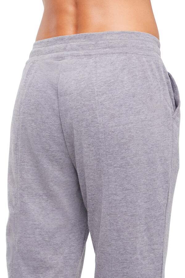 Lyla Mid Calf Capri, close-up view of fabric and stitching, showing visible design features and texture of the soft knit fabric.. 