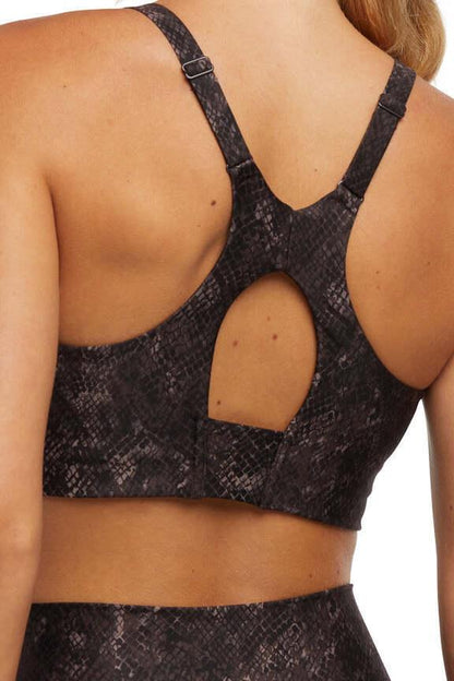 Clarissa Sports Bra, close-up view of fabric and stitching, showing visible design features and texture of the soft knit fabric.. 
