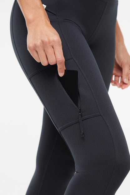 Faye Side Pocket Legging, alternate angle view, showing visible design features and texture of the stretch knit fabric.. 