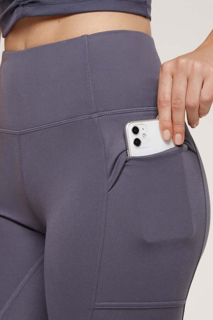 Faye Side Pocket Legging, alternate angle view, showing visible design features and texture of the stretch knit fabric.. 