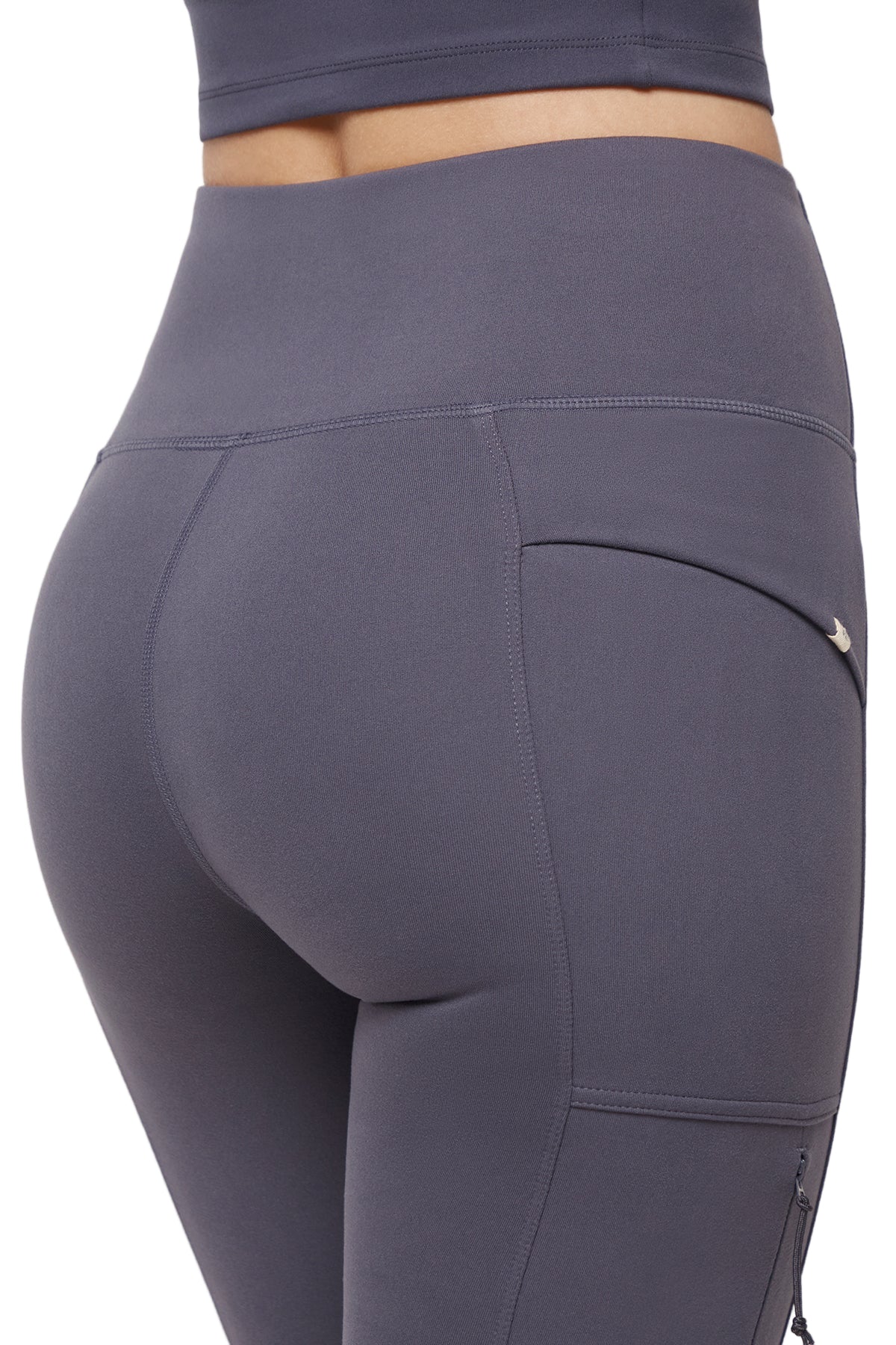 Faye Side Pocket Legging, side view showing pocket placement, showing visible design features and texture of the stretch knit fabric.. 