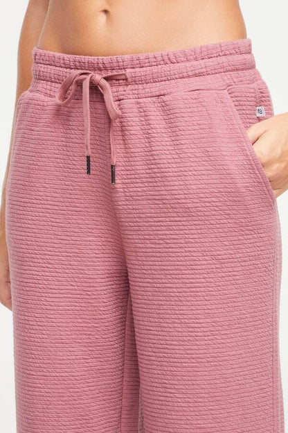 Freyi Pant, alternate angle view, showing visible design features and texture of the durable stretch fabric.. 