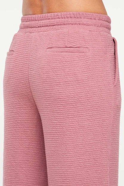 Freyi Pant, alternate angle view, showing visible design features and texture of the durable stretch fabric.. 